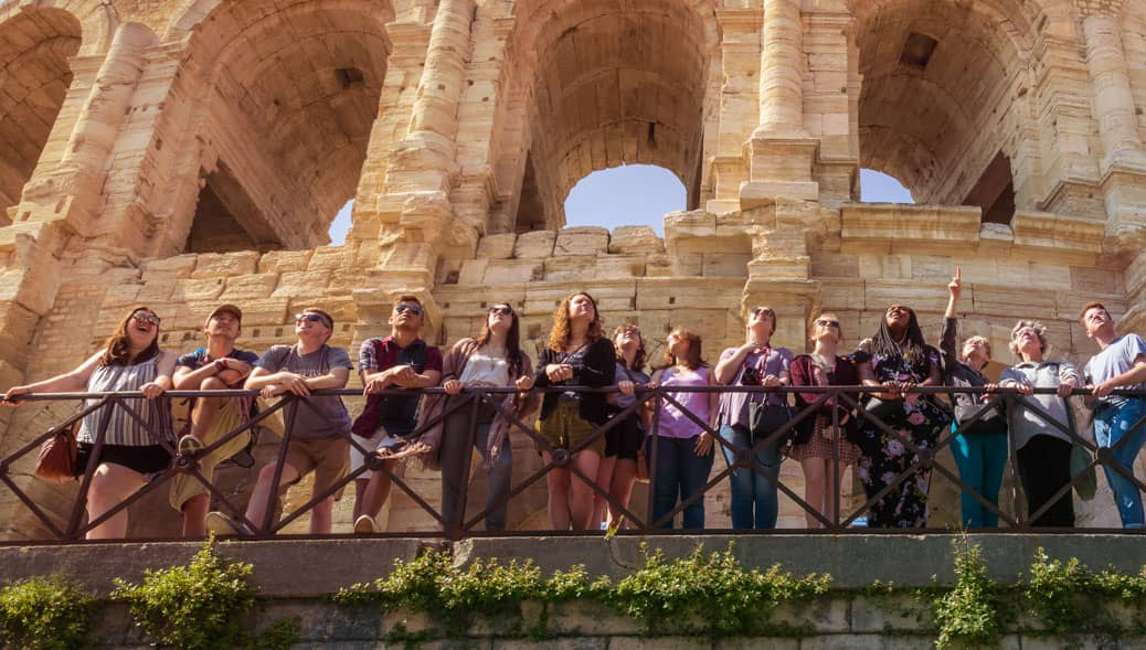Students and professors take in the view from Roman amphitheater in Arles