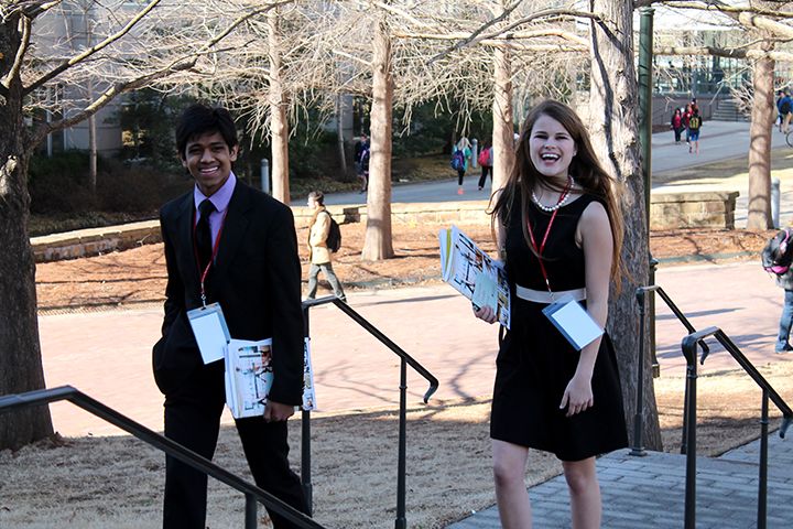 A male and female student are touring campus.