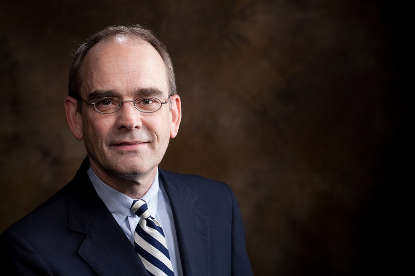 portrait of man on black background