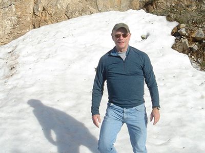 Man standing on glacier