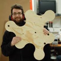 man posing with mathematical art