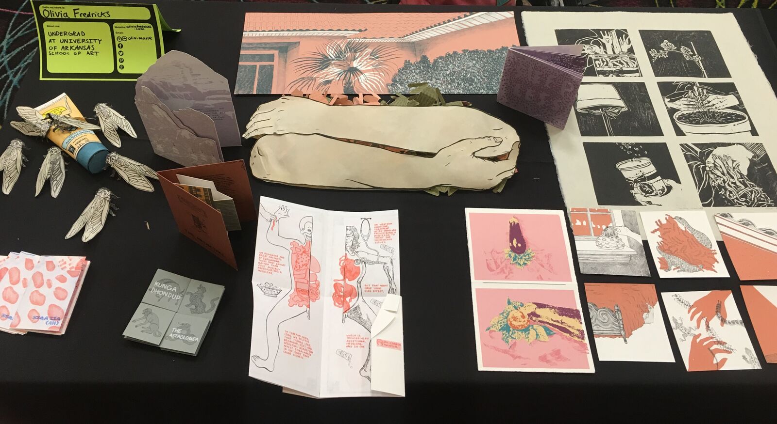 sampling of hand-drawn artwork on tabletop