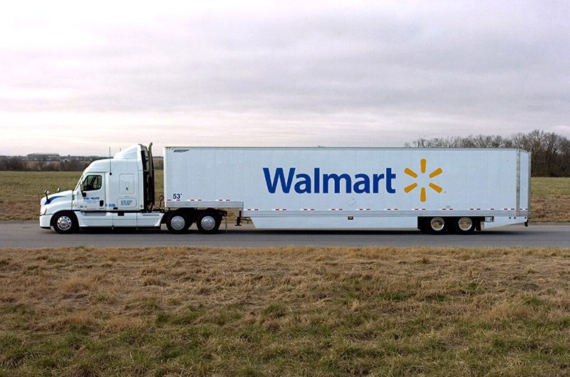 Walmart truck crossing a plain
